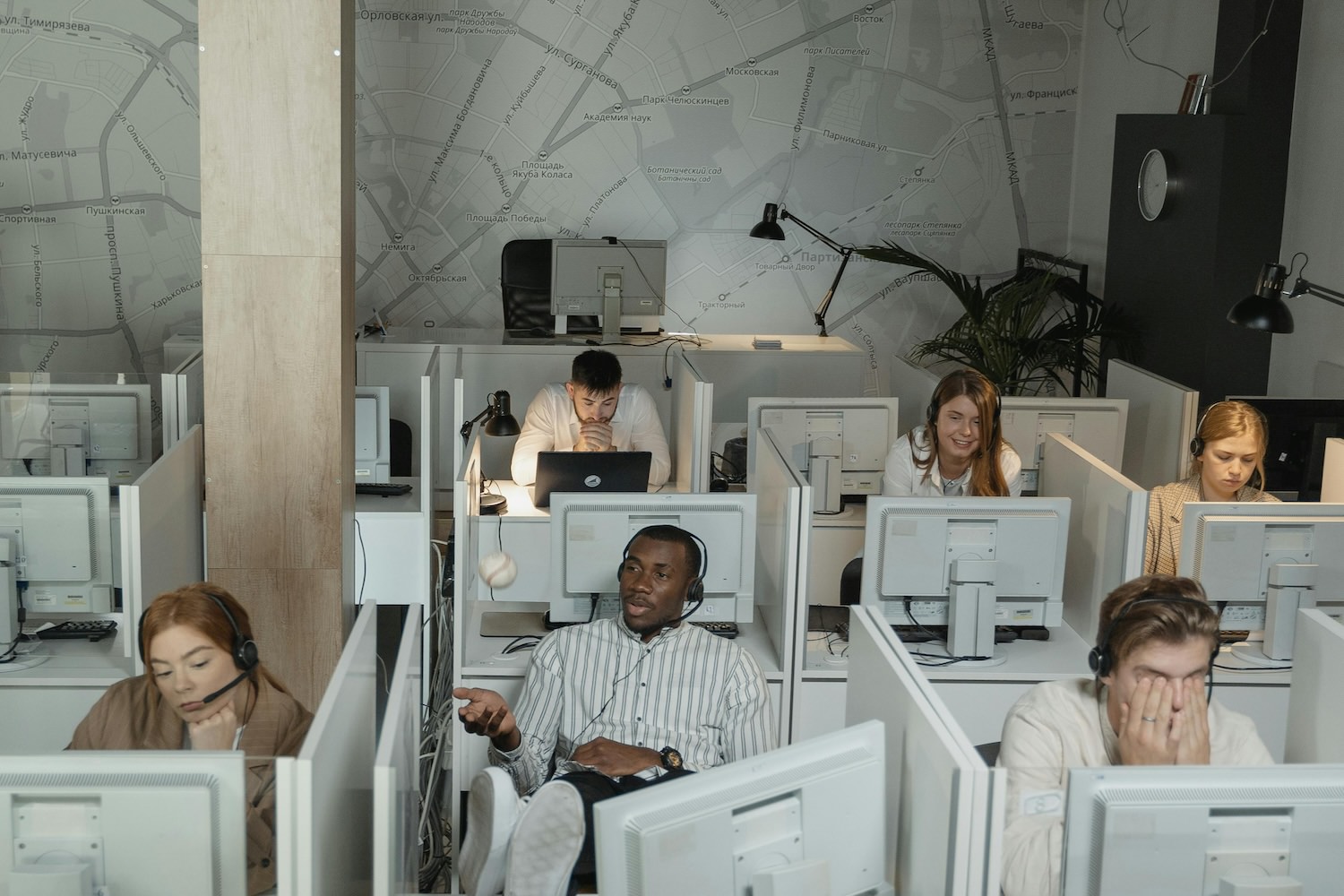 office worker looking bored in a cubicle