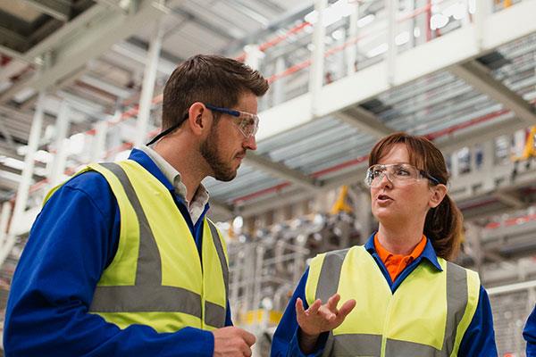 two safety engineers discussing situation