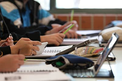 Students at a table studying